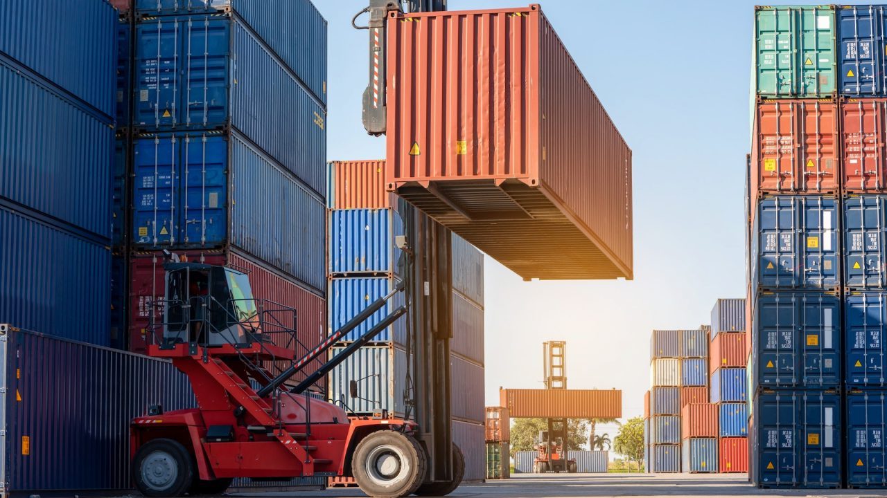 forklift moving a container